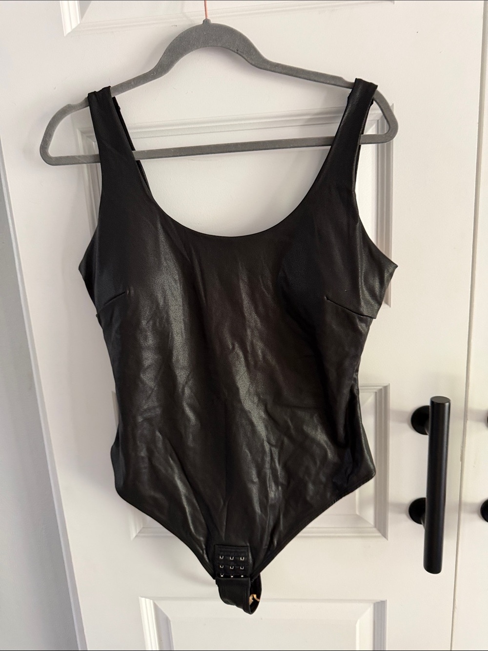 One-Piece Faux Leather Bodysuit in Black
